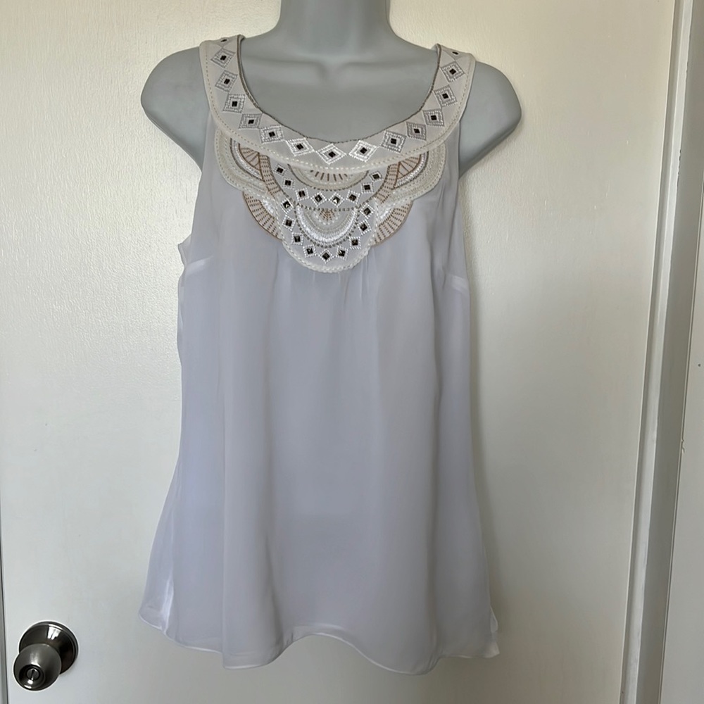 White House, Black market shell, with a embroidered neckline detailing